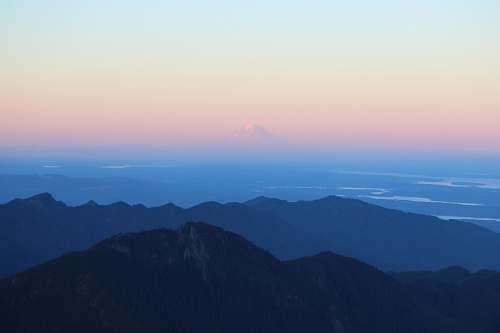 mountain range landscape photography of silhouette of mountains during daytime sunrise